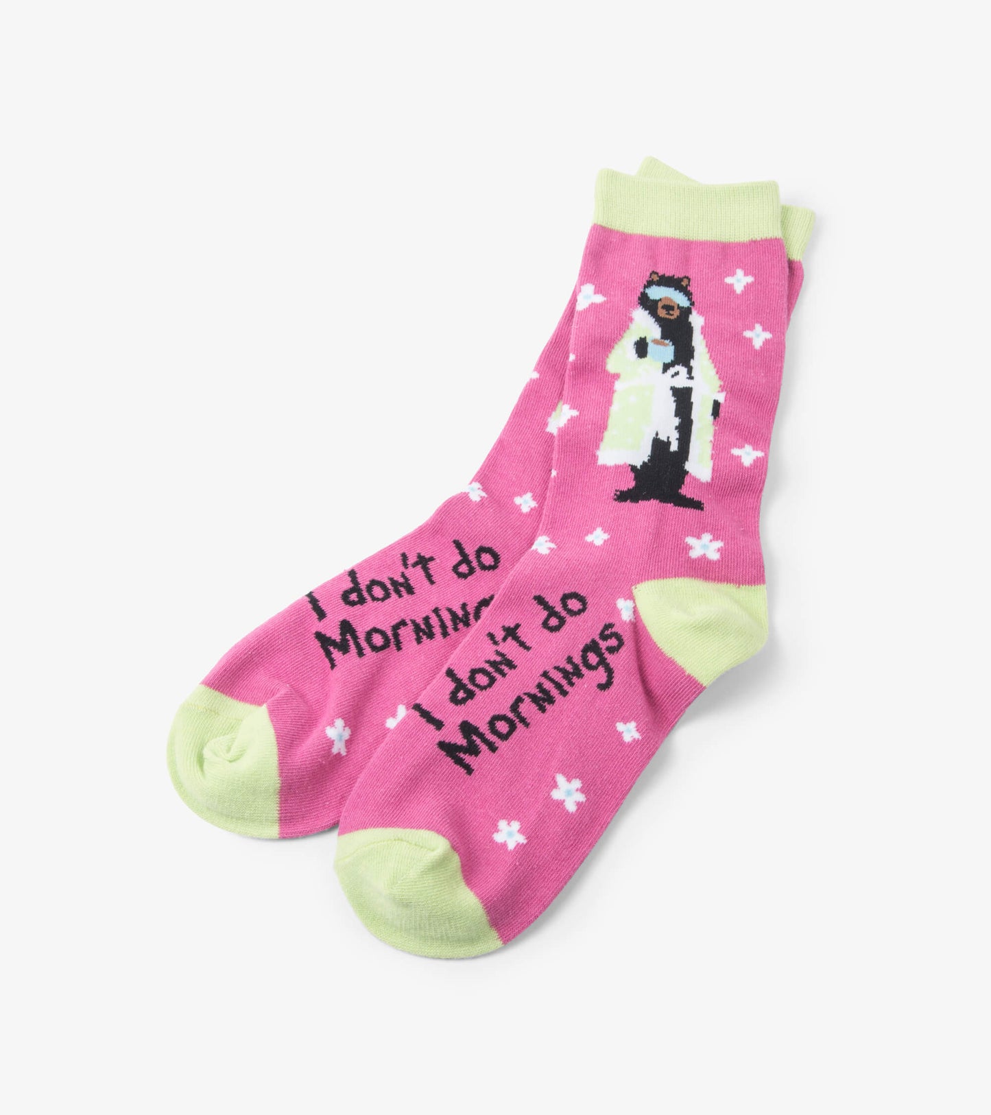 Pink crew socks featuring a bear in a robe and the text "I don't do Mornings," with light green accents and floral patterns.