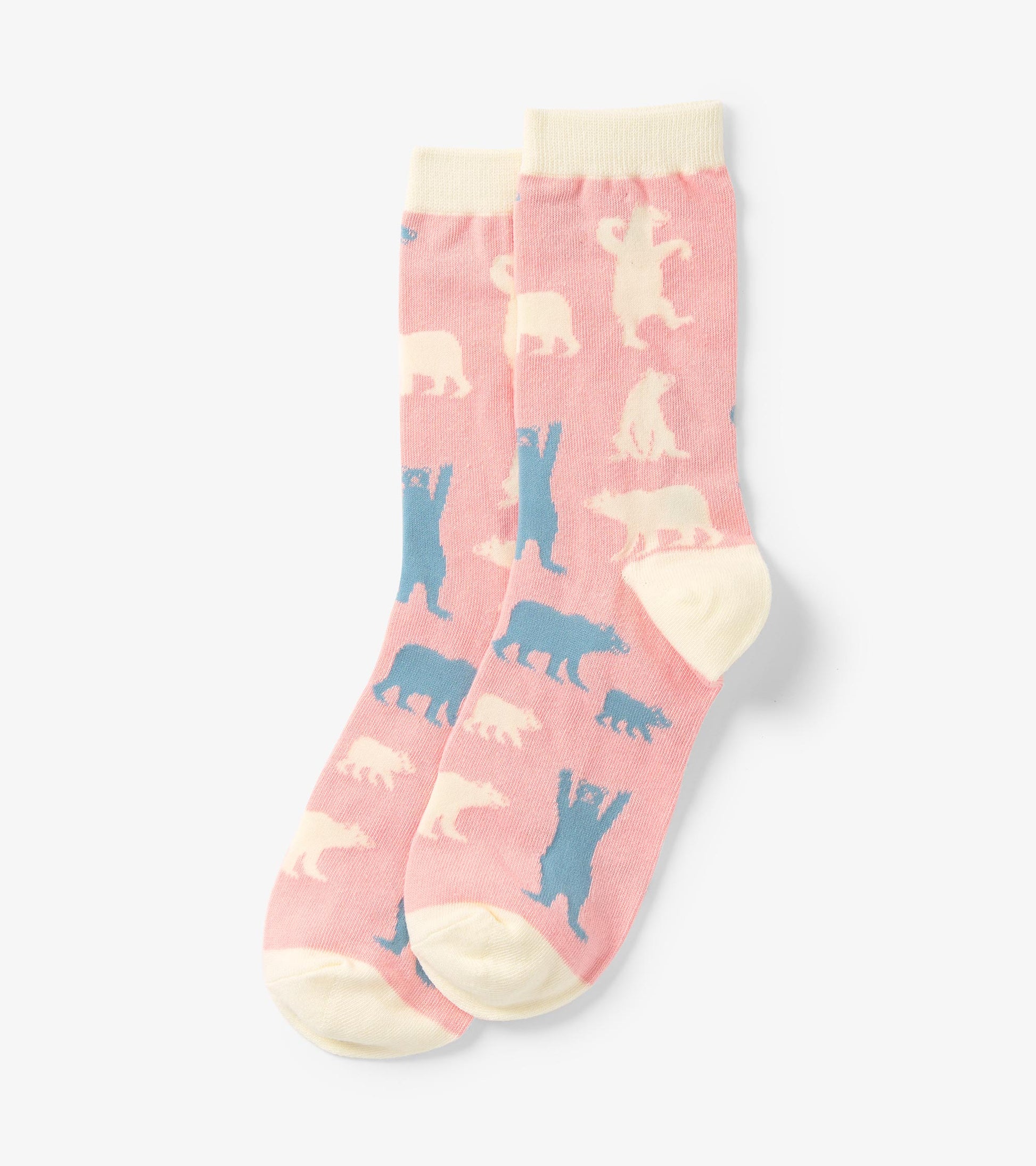 Pink crew socks featuring playful polar bear patterns in blue and cream. One size fits most.