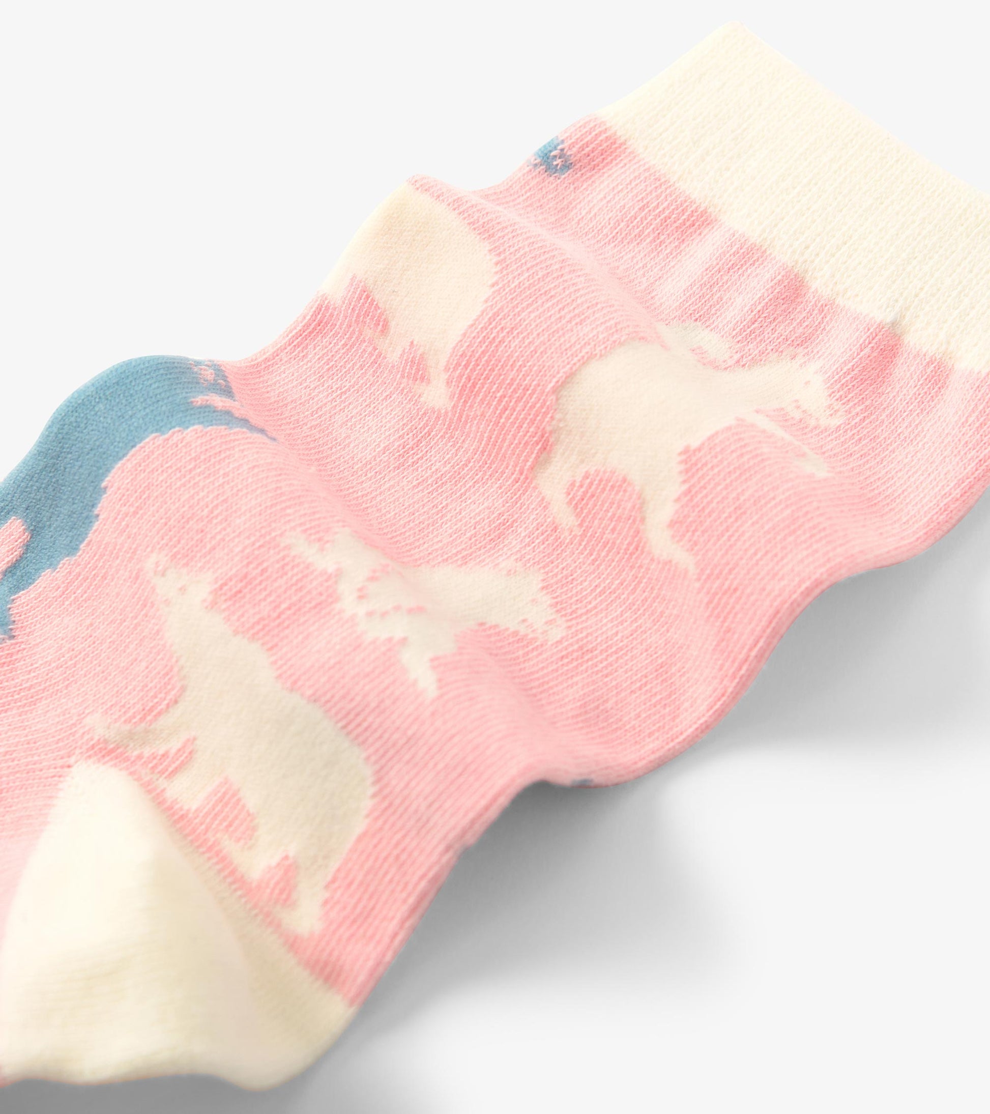 Pink crew socks featuring polar bear patterns, made from soft material, suitable for casual wear.