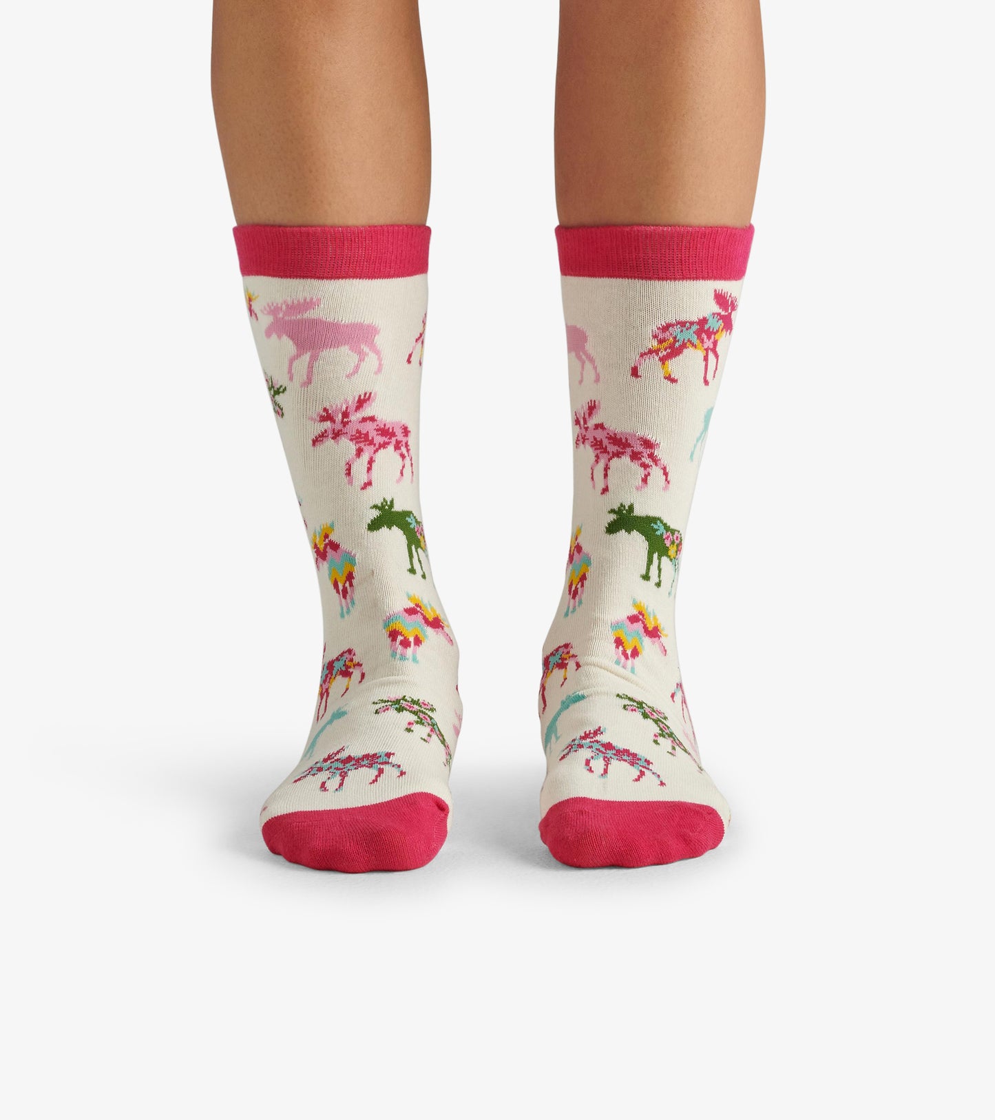 Women's crew socks featuring a colorful moose pattern on a cream background with pink cuffs and toes.