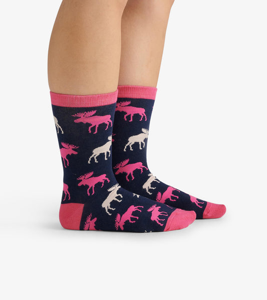 Navy crew socks featuring pink and white moose patterns with contrasting pink cuffs and toes. One size fits most.