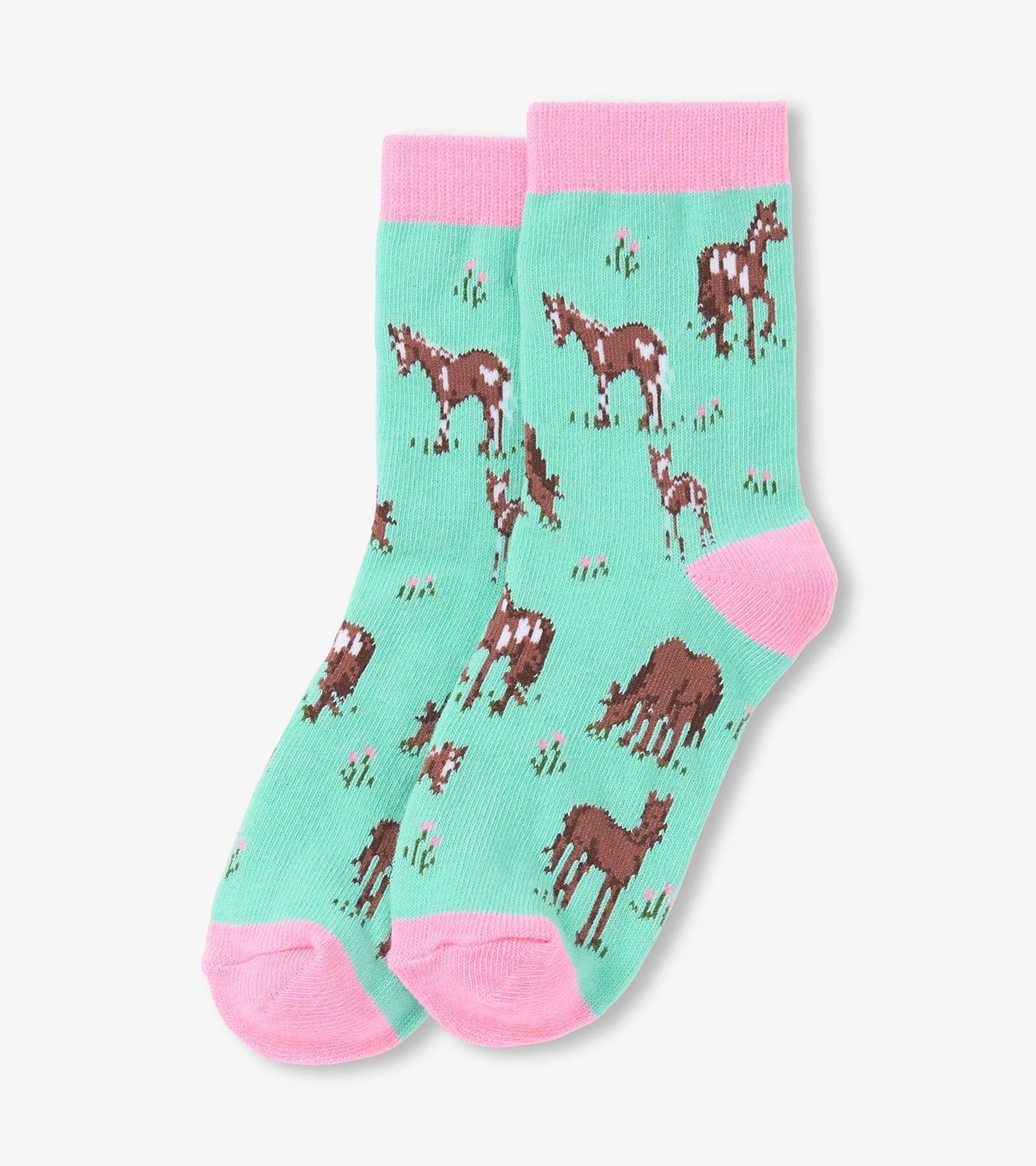 Mint green crew socks featuring playful horse patterns and pink cuffs, suitable for ages 2-7.