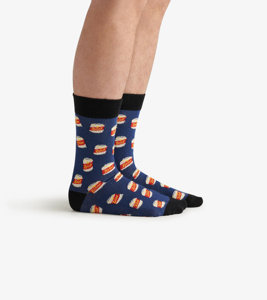 Navy crew socks featuring a playful beer can pattern and black ribbed cuffs, designed for casual wear.