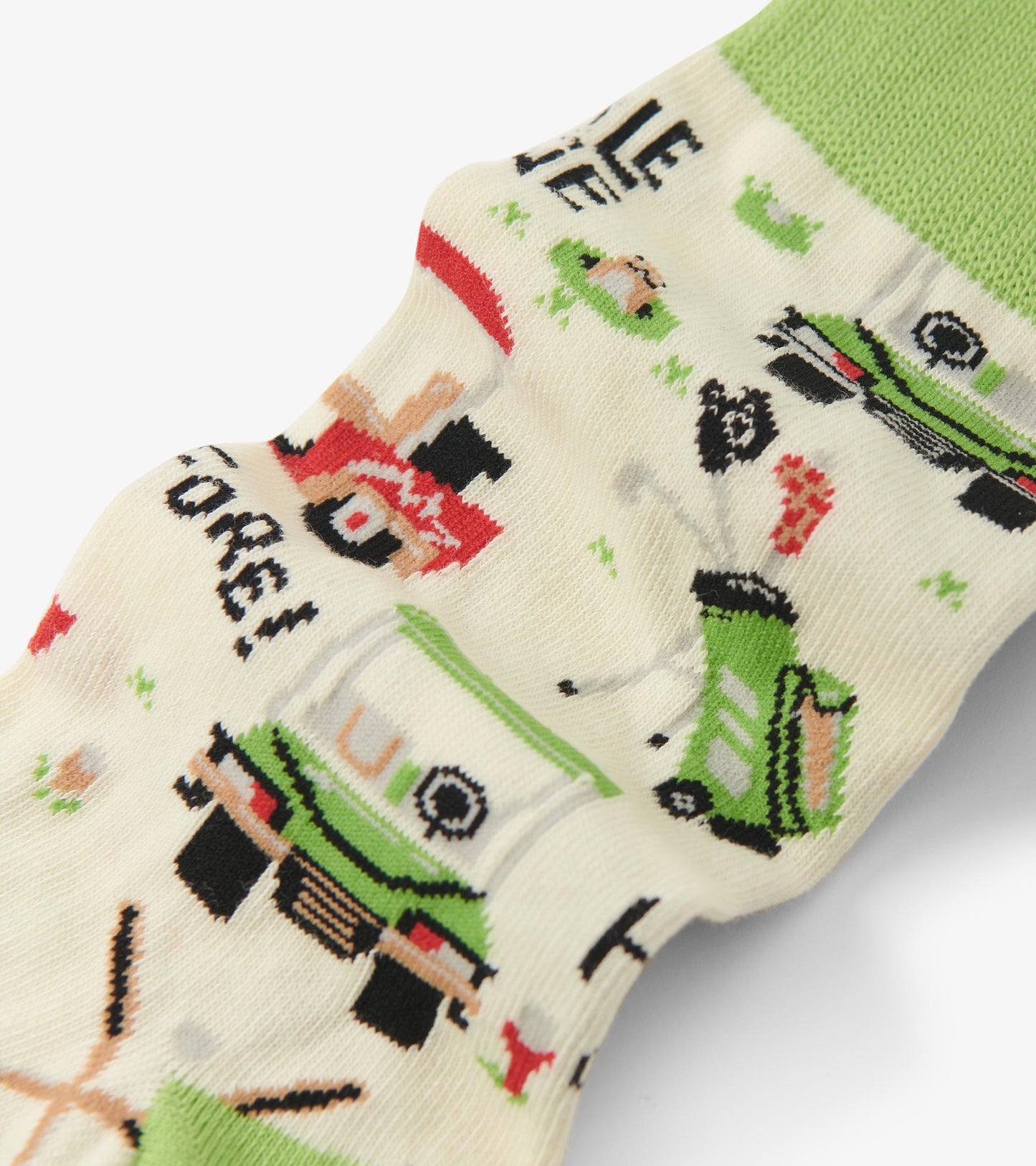 Cream-colored crew socks featuring a playful pattern of lawnmowers and gardening tools with green accents.