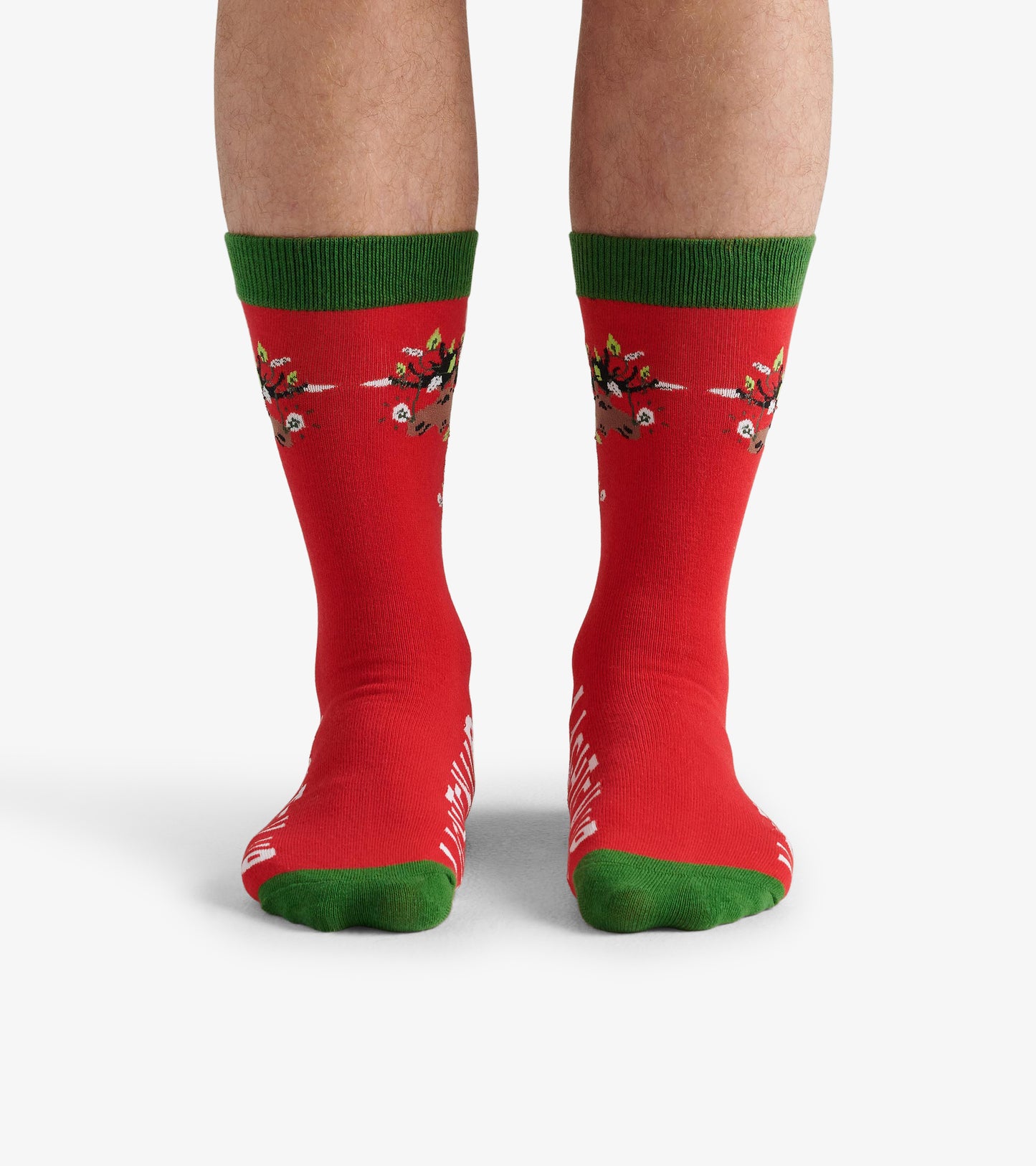 Red crew socks with green cuffs and toe, featuring a moose design and festive elements.