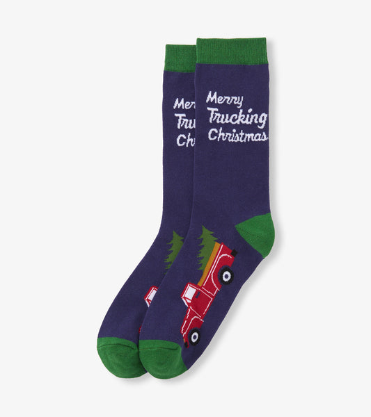 Purple crew socks featuring a red truck hauling a tree and green accents, with "Merry Trucking Christmas" text.