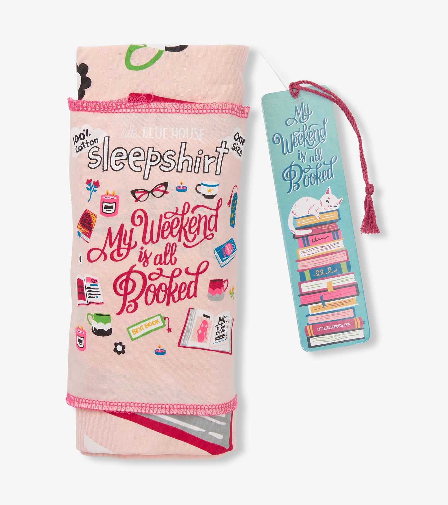 Folded pink book-print sleepshirt with blue bookmark tag featuring a white cat on a stack of books