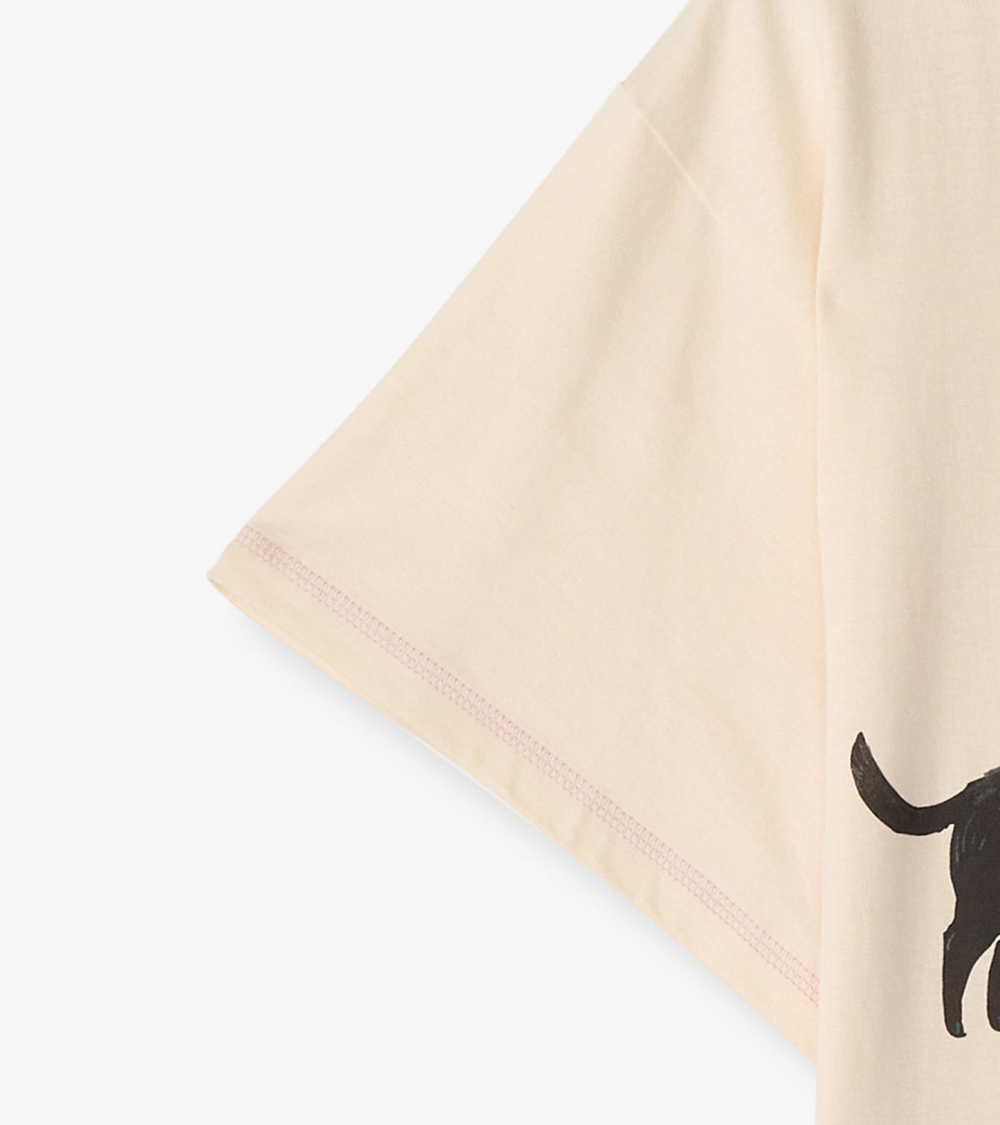 Light pink sleepshirt with short sleeves featuring a black dog graphic, designed for comfort and relaxation.