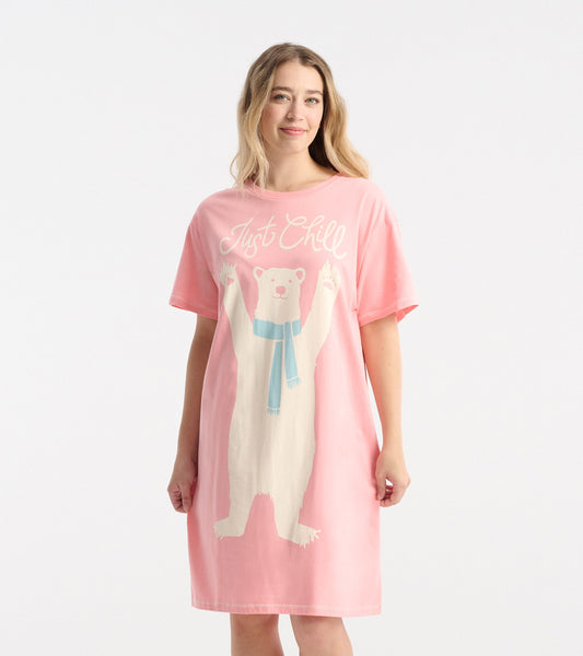 Pink short-sleeve sleepshirt featuring a playful polar bear graphic and the text "Just Chill." Relaxed fit, knee-length.