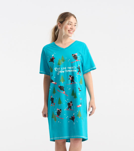 Turquoise sleepshirt featuring a playful winter scene with bears skiing and trees, short sleeves, and a V-neck design.