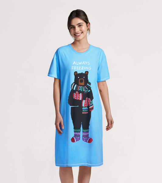 Light blue sleepshirt featuring a bear graphic wearing colorful winter accessories, designed for comfort and relaxation.