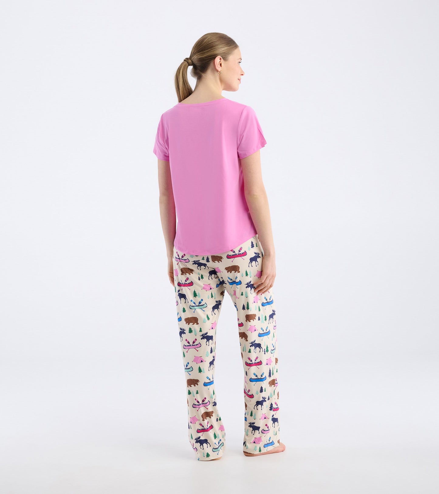Pink V-neck t-shirt with short sleeves, shown from the back, paired with patterned pajama pants.