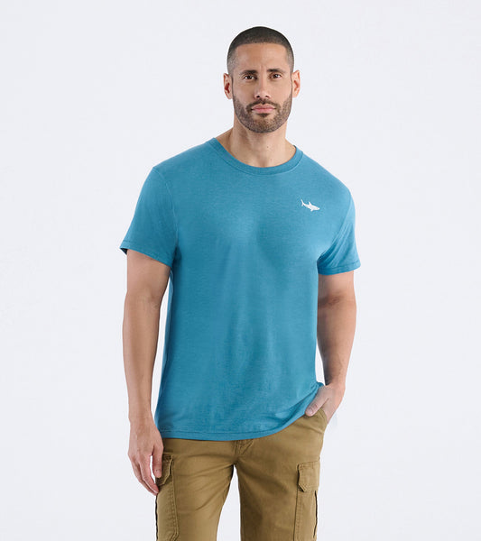 Men's short-sleeve tee in teal with a shark graphic on the chest, perfect for casual wear.