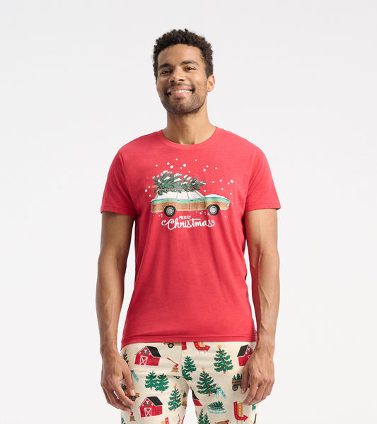 Red short-sleeve t-shirt featuring a festive car graphic with a Christmas tree and snowflakes.
