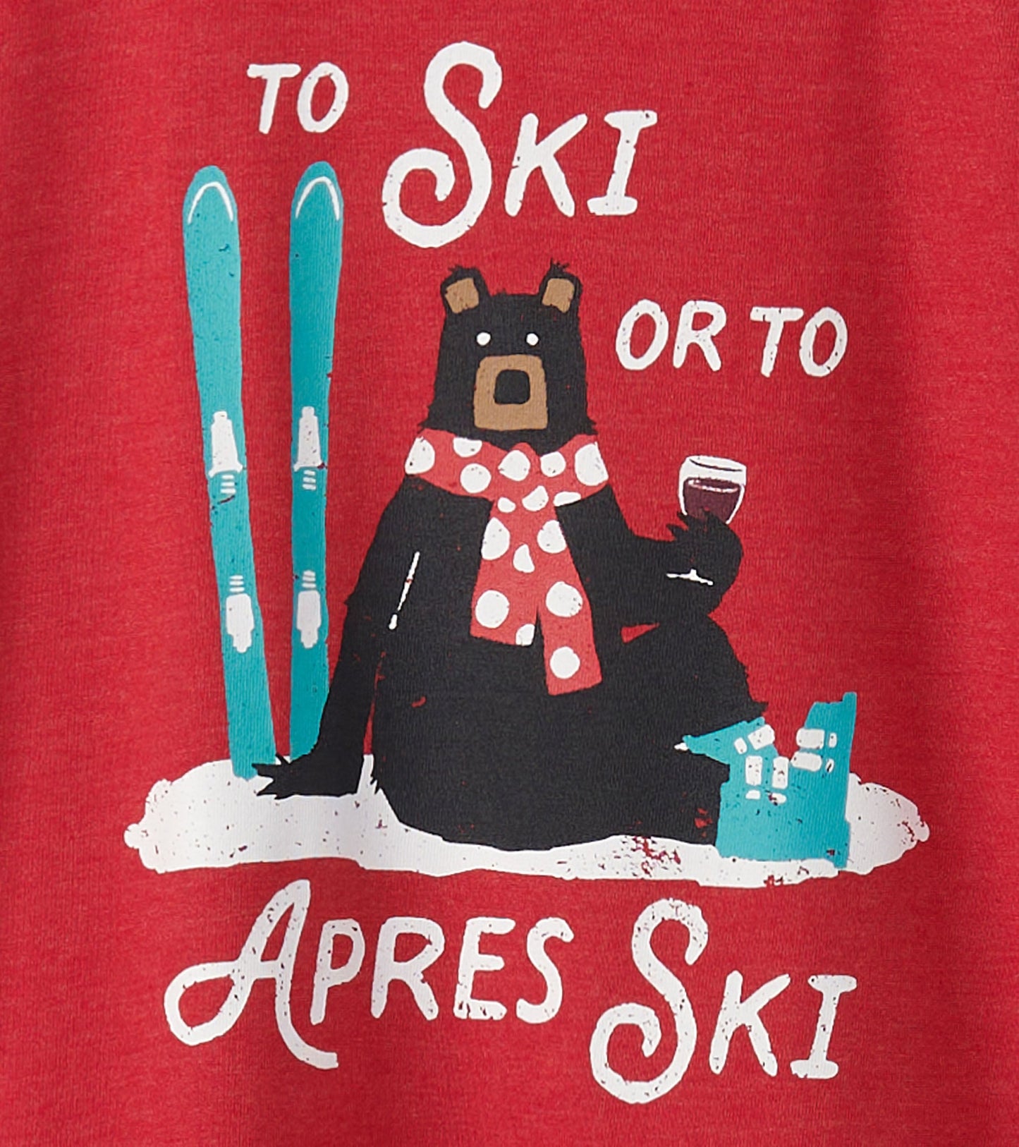 Red pajama tee featuring a bear in a polka dot scarf, skis, and a drink, with the text "To Ski or To Apres Ski.