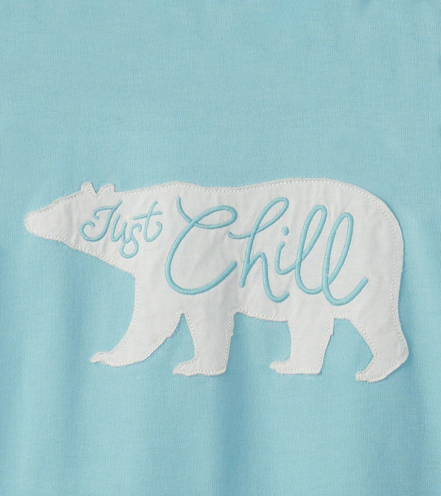 Light blue pajama tee featuring a white bear silhouette with "Just Chill" embroidered in blue.