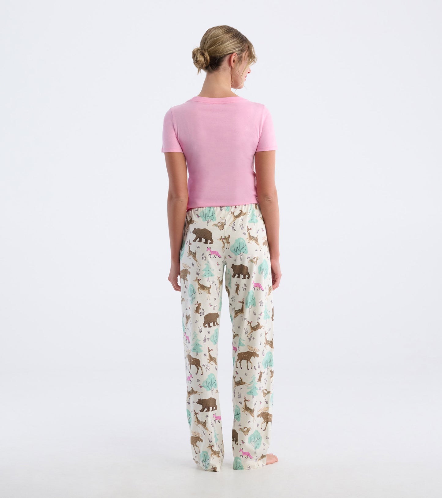 Back view of a pink short-sleeve pajama T-shirt with cream animal-print pajama pants