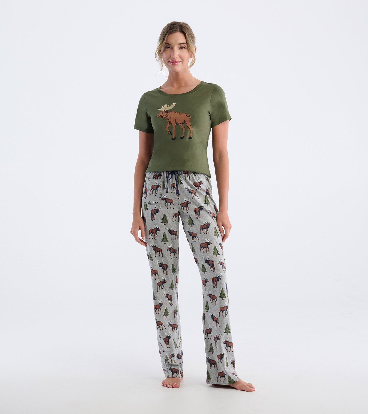 Olive green pajama t-shirt with a moose graphic, paired with gray pants featuring moose and tree patterns.
