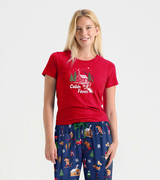 Red short-sleeve pajama t-shirt featuring a cabin and tree graphic, perfect for cozy winter nights.