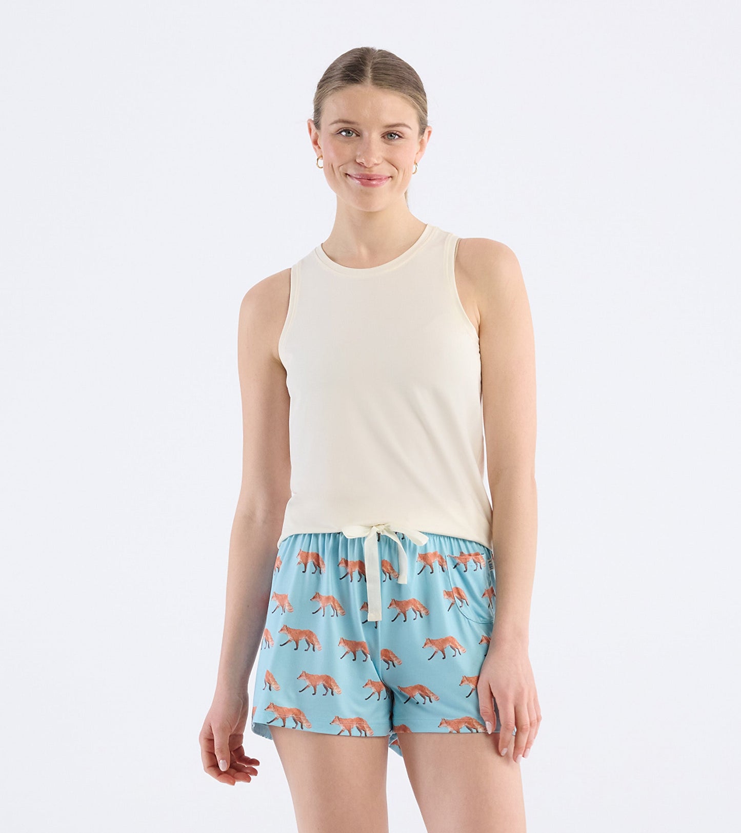 Cream tank top paired with light blue shorts featuring a fox pattern, ideal for loungewear or sleepwear.
