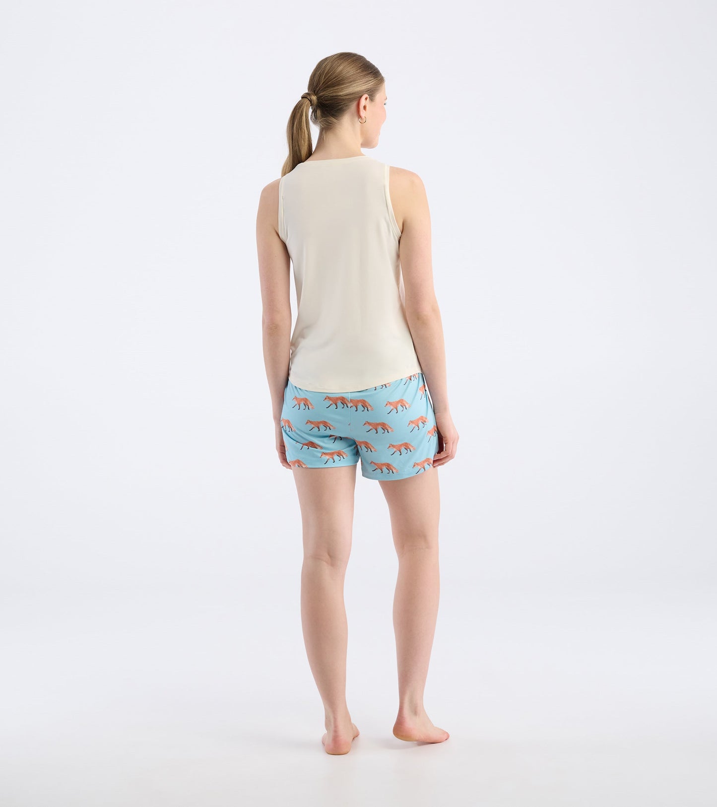 Cream sleeveless pajama tank paired with blue shorts featuring a fox print, viewed from the back.