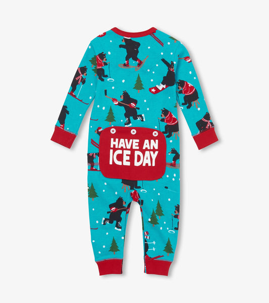 Turquoise union suit featuring playful bear skiing graphics and red accents, with "HAVE AN ICE DAY" on the back.