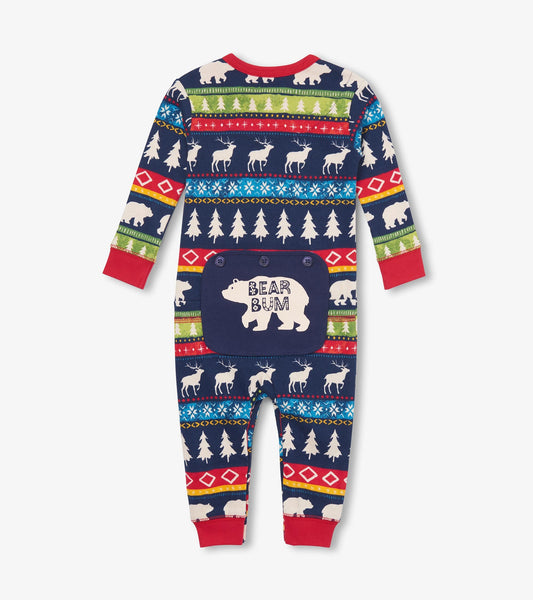 Navy union suit featuring a Fair Isle pattern with bears, trees, and reindeer, red cuffs, and a "Bear Bum" graphic on the ba…