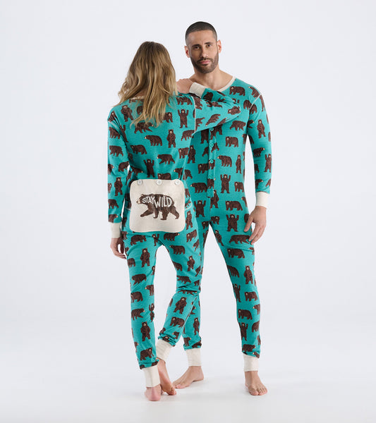 Turquoise onesie featuring brown bear patterns, with ribbed cuffs and a playful design, worn by a couple.