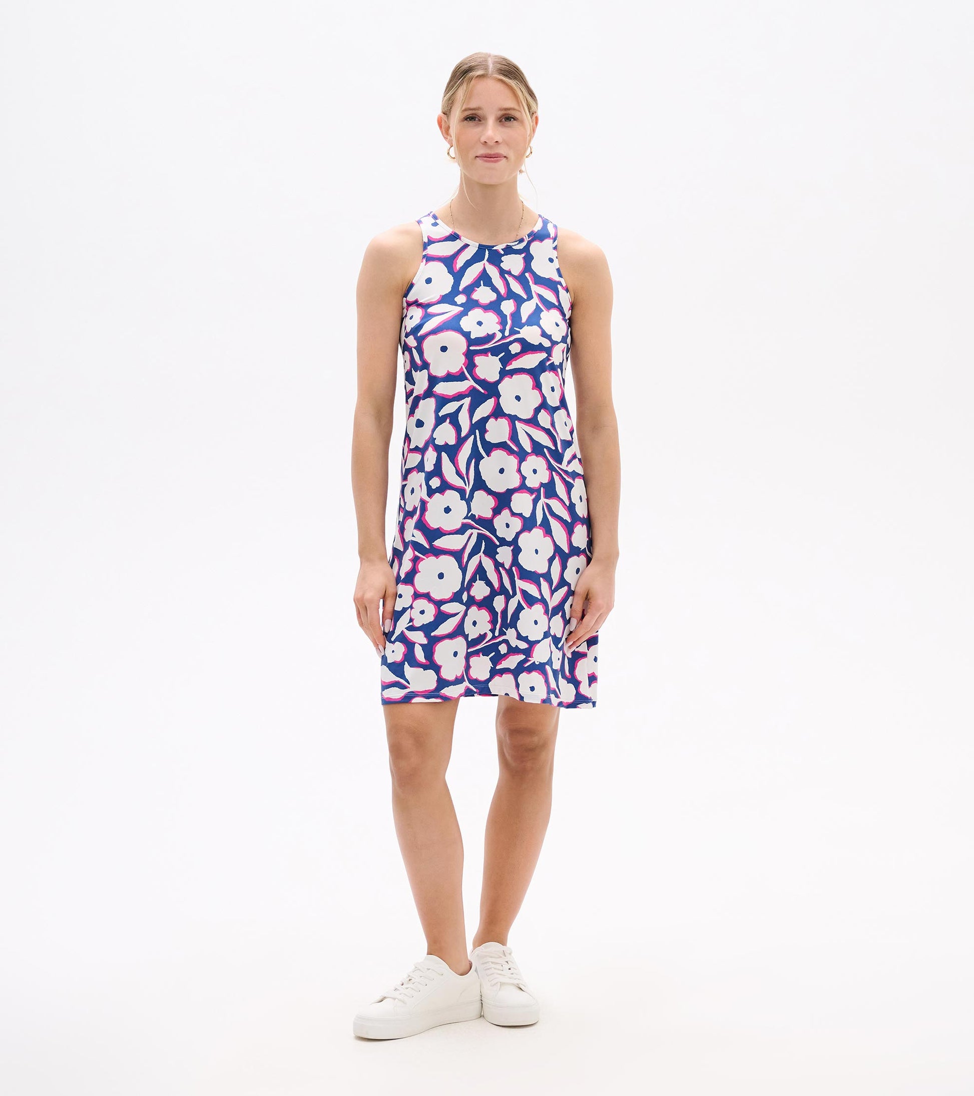 Sleeveless summer dress featuring a vibrant floral pattern in purple, pink, and white, perfect for warm weather.