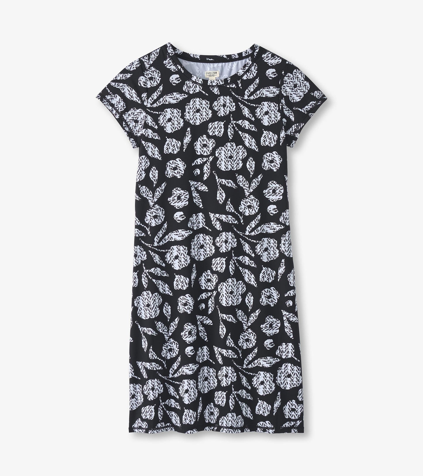 Black t-shirt dress featuring a white floral and leaf pattern, short sleeves, and a relaxed fit.