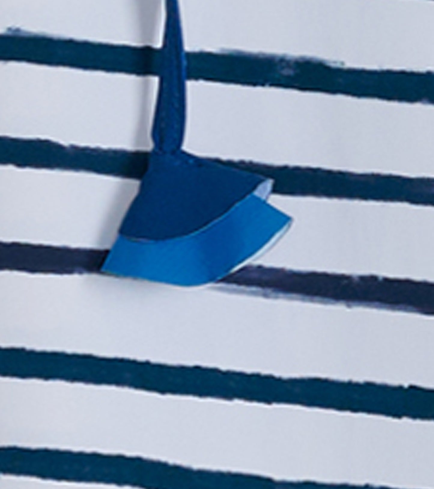 Blue and white striped beach dress with a rounded neckline and a playful hem detail. Ideal for seaside outings.