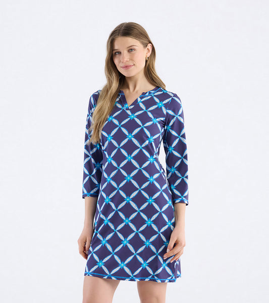 Navy dress with a diamond ikat pattern, notch neck, and three-quarter sleeves, suitable for casual wear.