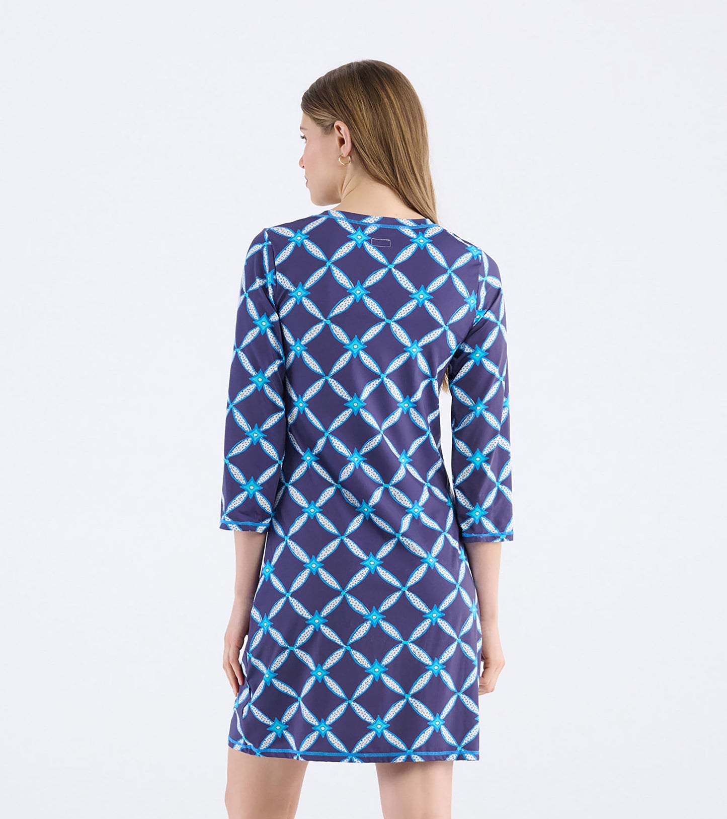 Navy dress with a diamond ikat pattern, notch neck, and three-quarter sleeves, shown from the back.