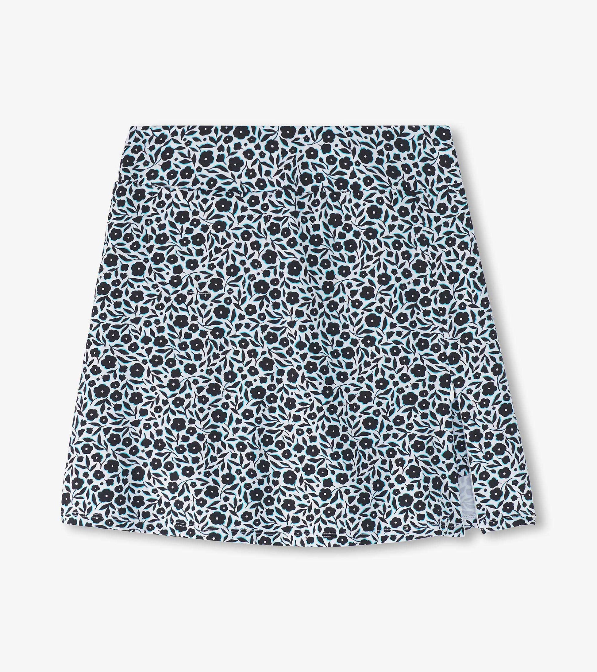 Floral-patterned skort in black, white, and blue, featuring a comfortable waistband and a relaxed fit.