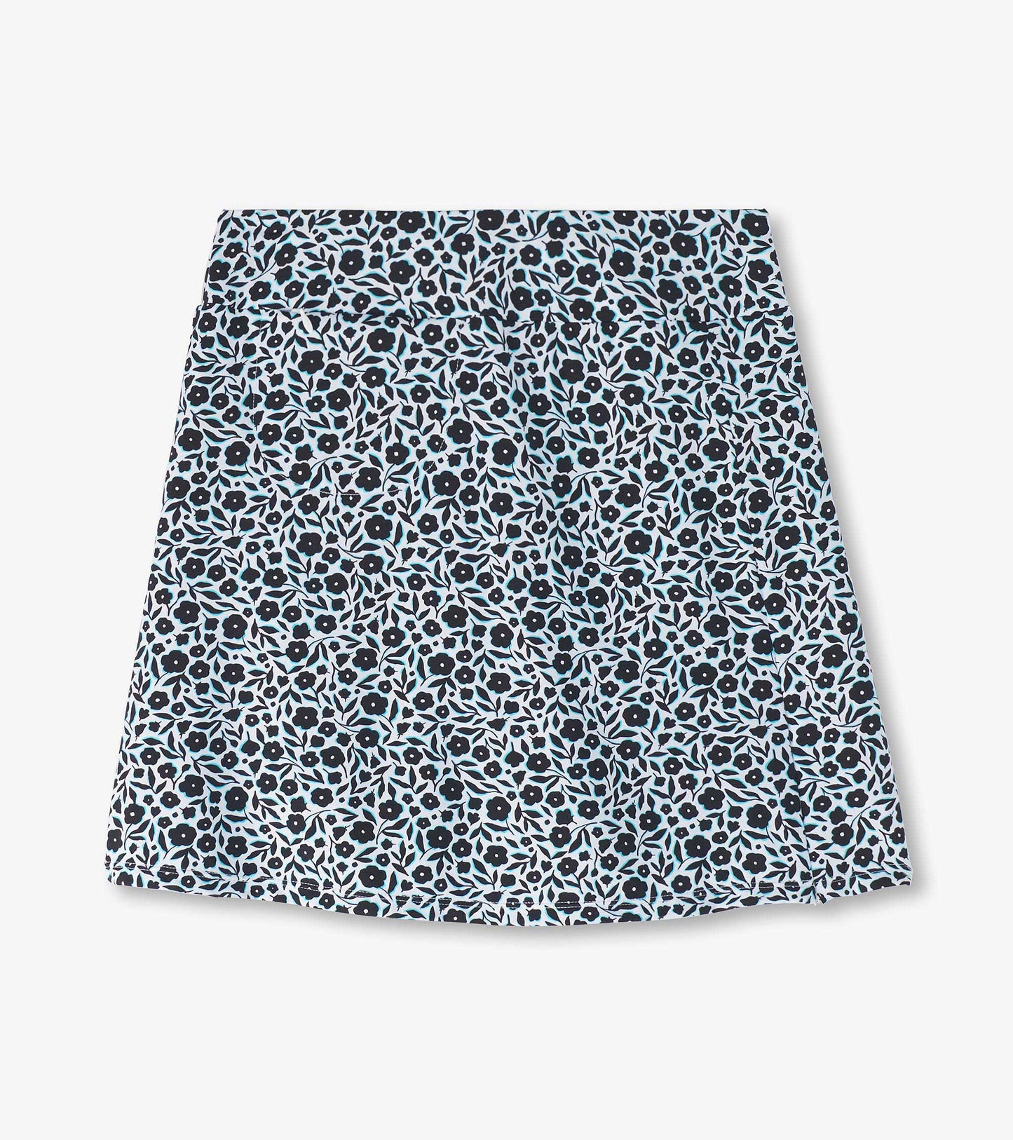Floral-patterned skort in navy blue with light blue and black flowers, featuring a comfortable waistband.