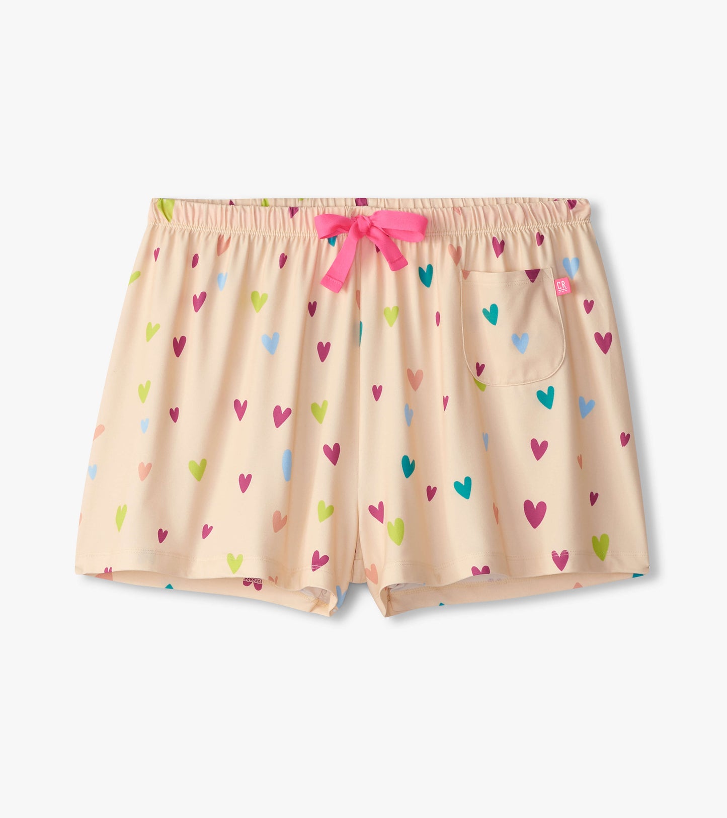 Peach polyknit pajama shorts with colorful heart patterns and a pink drawstring, featuring a side pocket.
