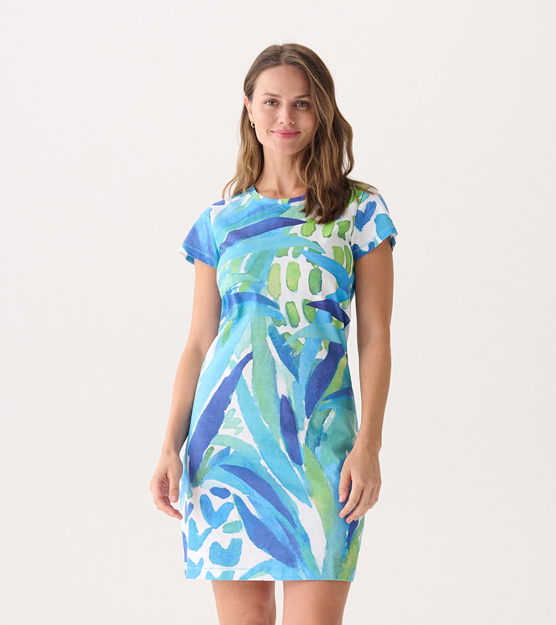 Short-sleeve crew neck dress featuring a vibrant blue and green pineapple and leaf pattern, ideal for casual wear.