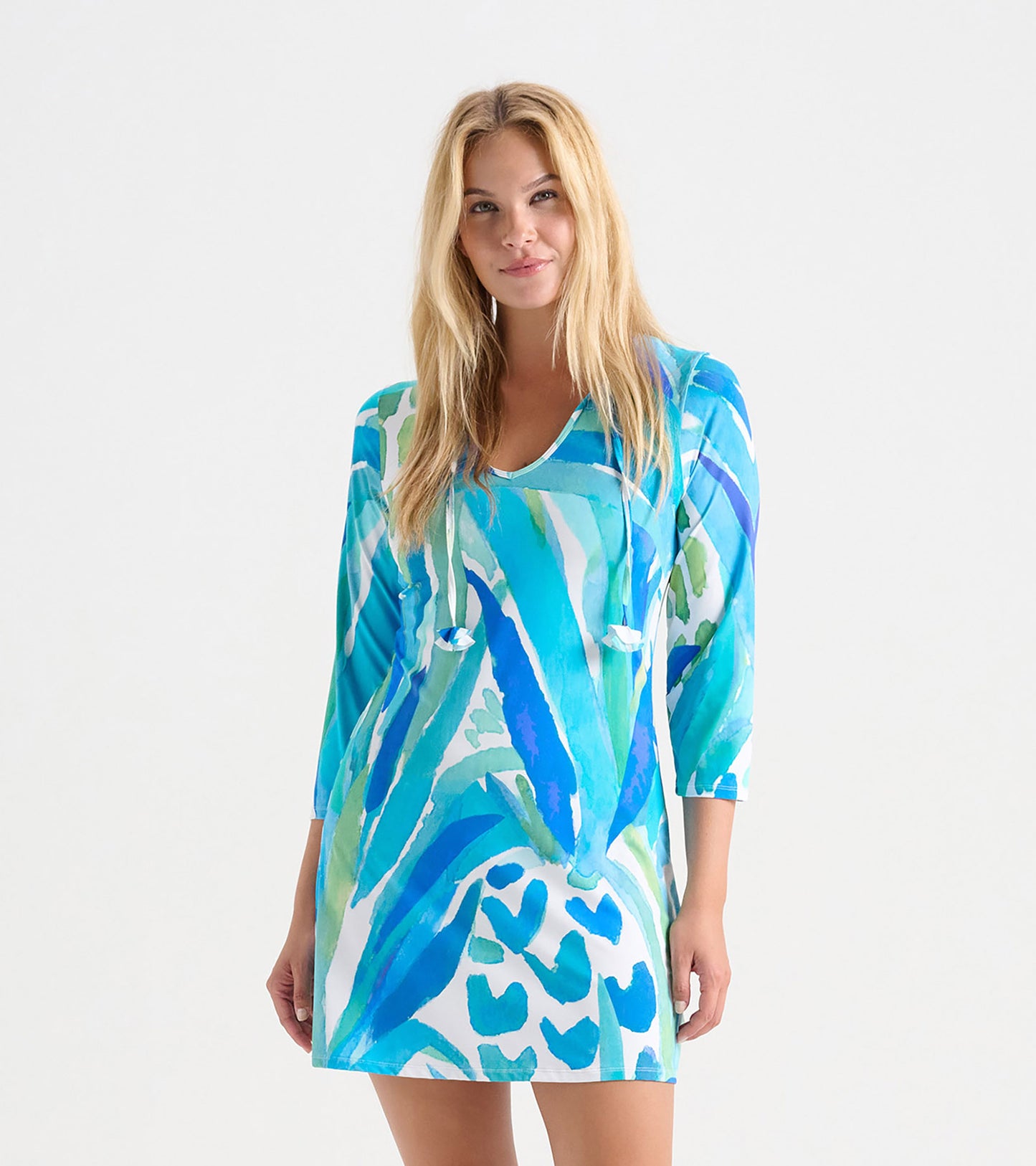 Colorful, short-sleeve beach dress featuring a vibrant blue and green abstract pattern, perfect for seaside wear.