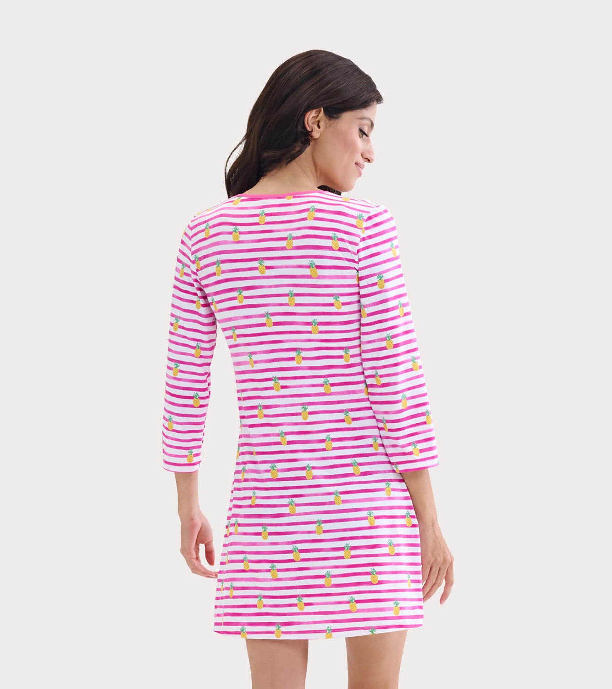 Pink and white striped beach dress with pineapple print, featuring three-quarter sleeves and a relaxed fit.
