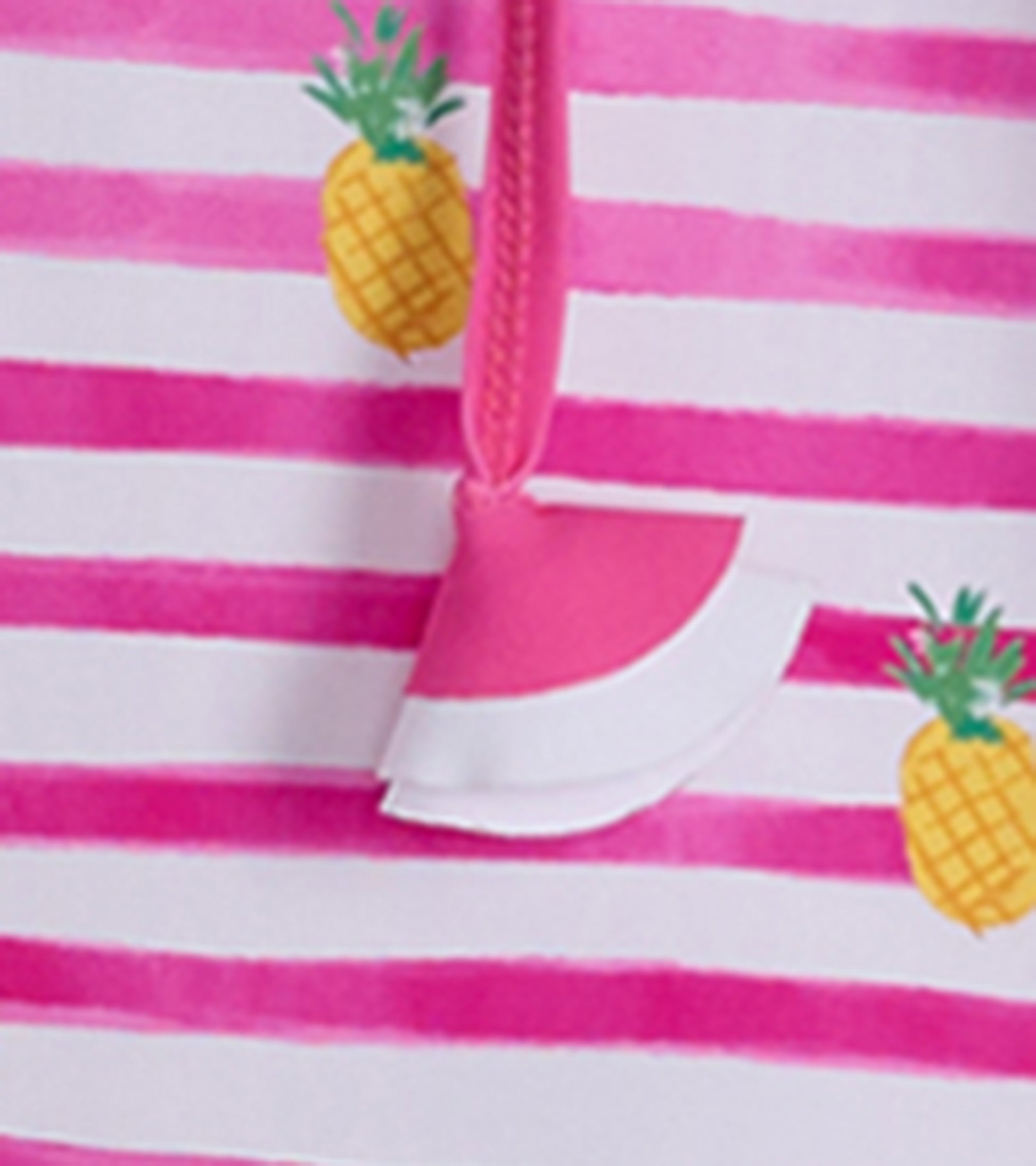 Pink and white striped beach dress featuring pineapple patterns and a ruffled hem detail.