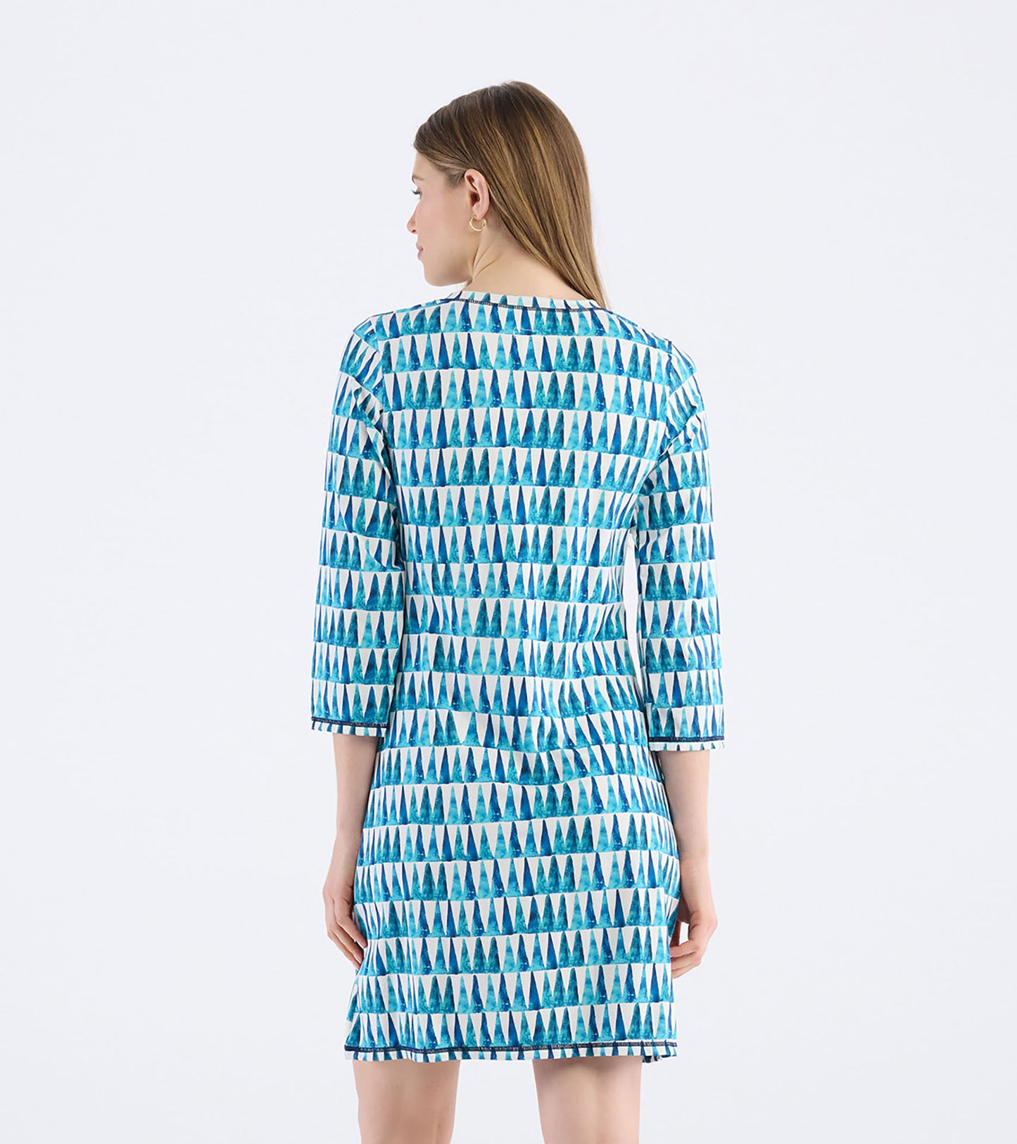 Back view of a women's dress featuring a painted triangle pattern in shades of blue and white, with a notch neck design.