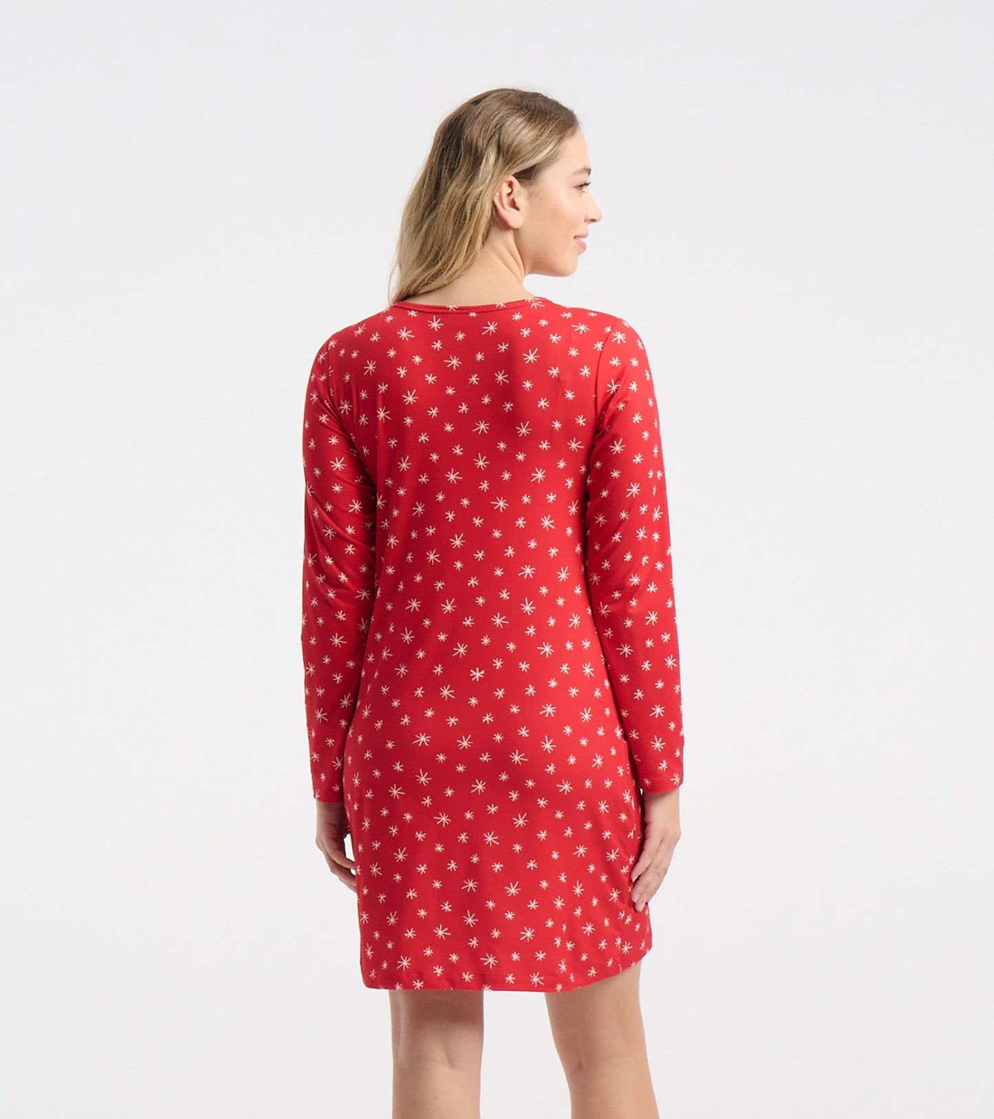 Red long sleeve nightshirt featuring a snowflake pattern, shown from the back. Made of soft polyknit material.