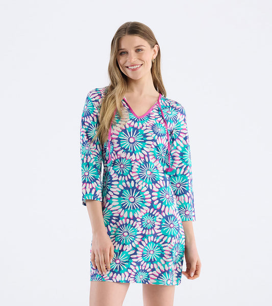 Colorful sundress featuring a vibrant floral mandala pattern in shades of blue, pink, and green, with a V-neck and three-qua…