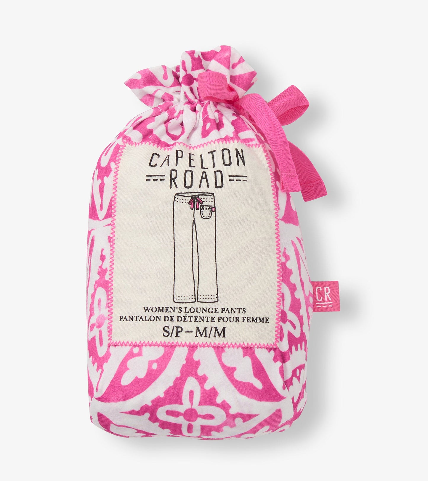 Pink pajama pants with a lotus mandala pattern, made from soft polyknit fabric, packaged in a drawstring bag.