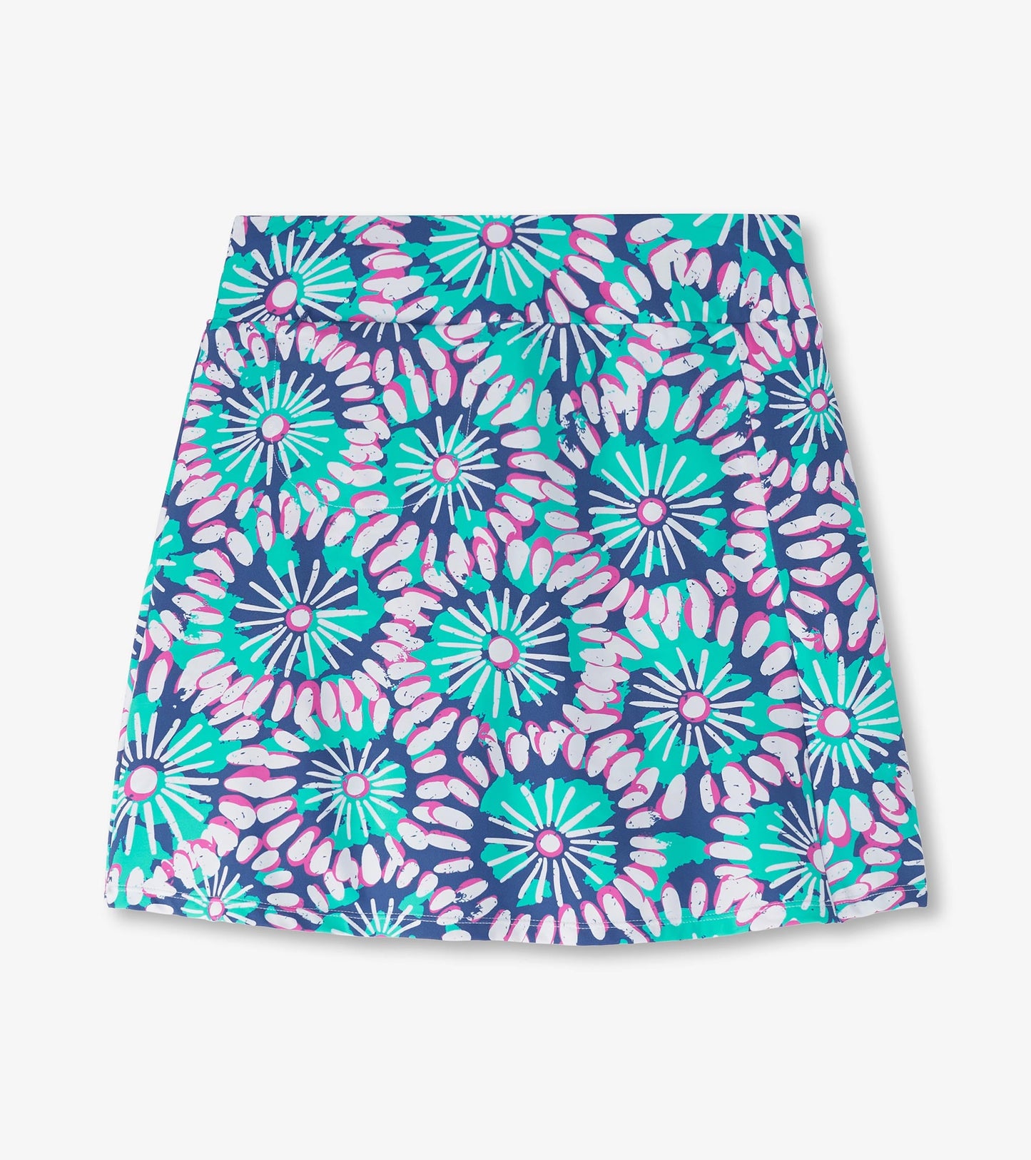 Colorful skort featuring a vibrant floral mandala pattern in teal, pink, and white on a navy background.
