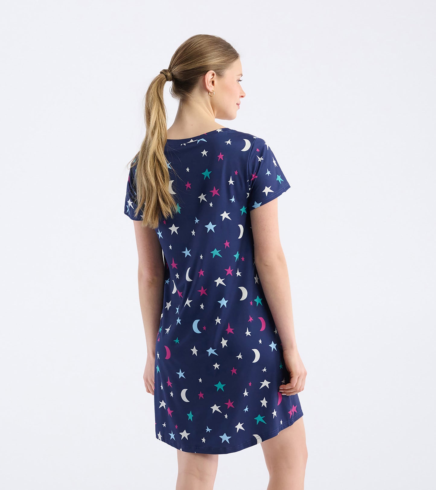 Navy nightdress featuring colorful stars and moons, short sleeves, and a relaxed fit, shown from the back.