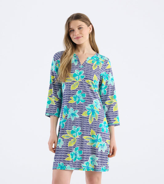 Notch neck dress featuring a bold floral pattern in turquoise and yellow on a navy background, with three-quarter sleeves.