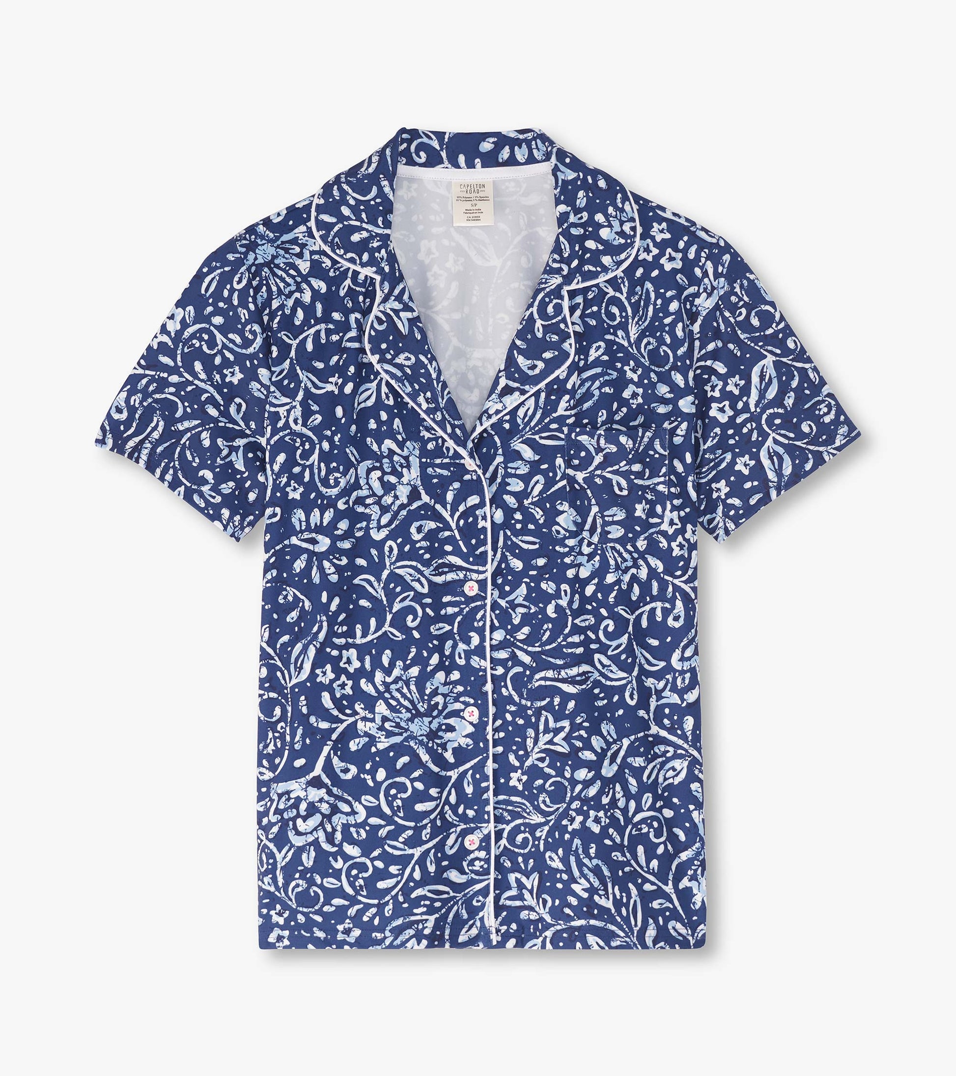 Navy short pajama set featuring a floral batik pattern and white piping, designed for comfort and relaxation.