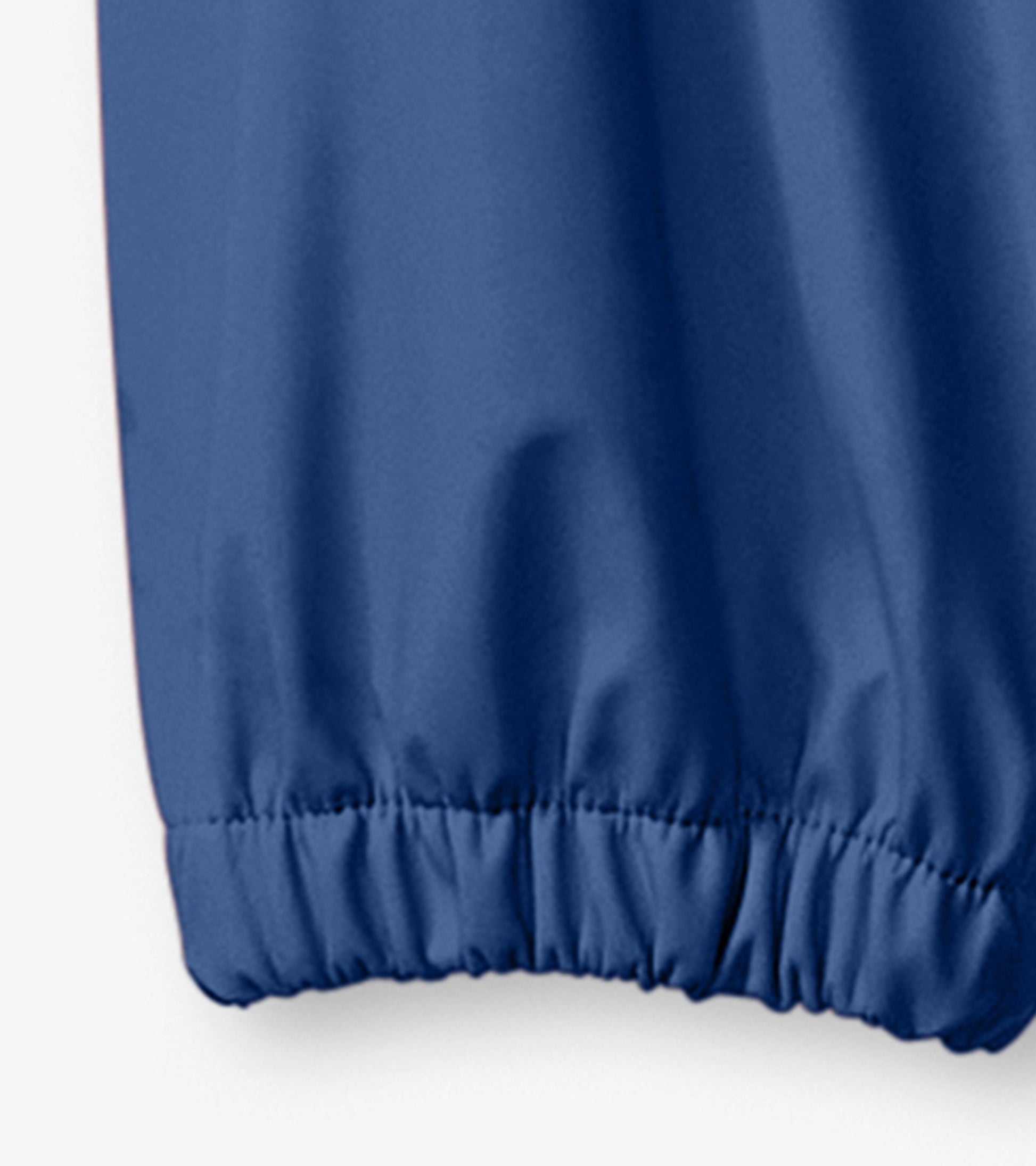 Navy blue kids' rain pants with elastic cuffs, made from waterproof material for outdoor play.