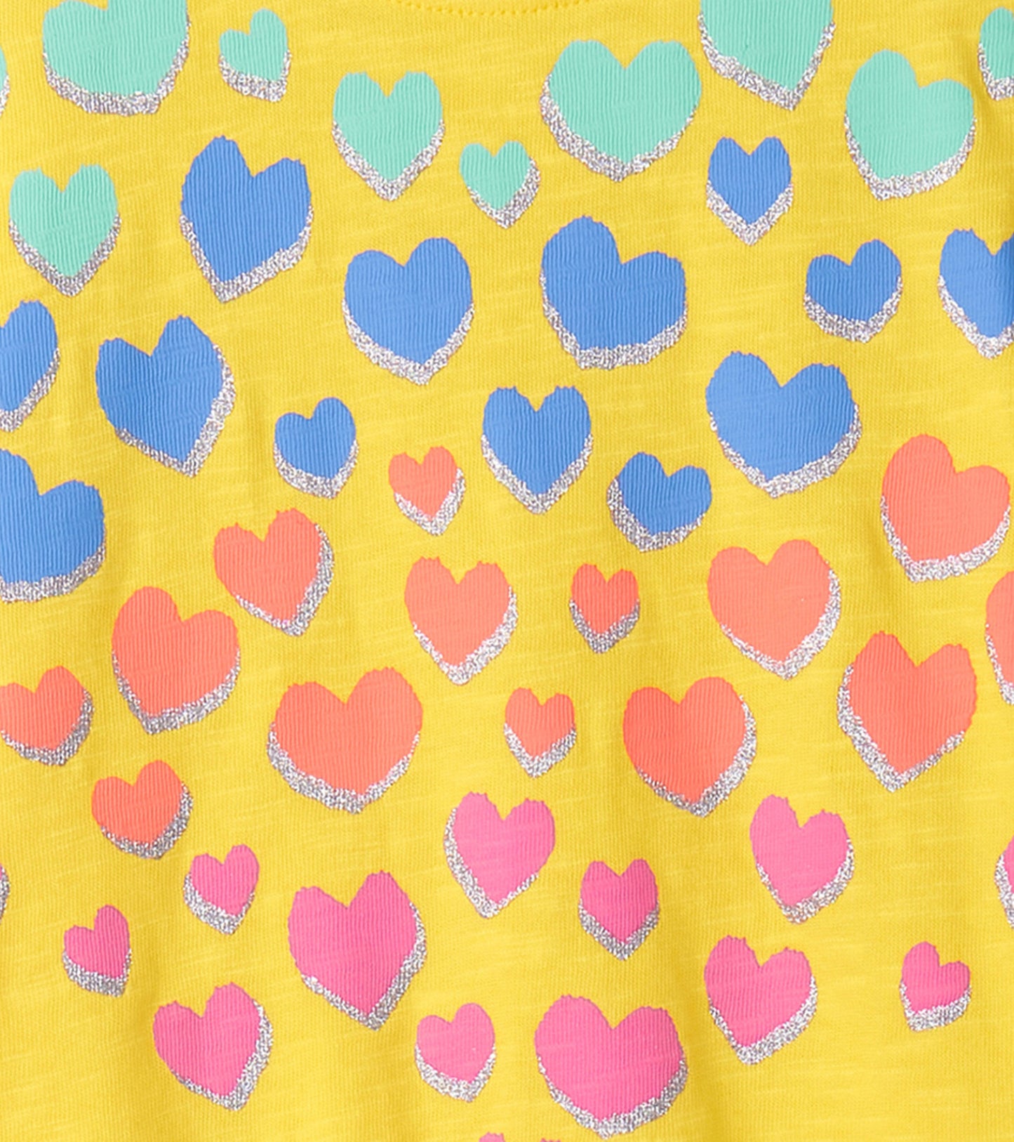 Yellow graphic tee featuring colorful hearts in various sizes with a glittery outline.